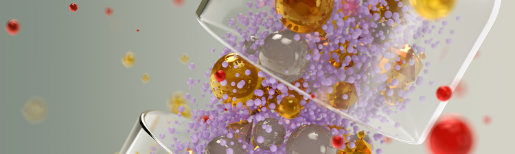Shiny transparent capsule filled with colorful spheres